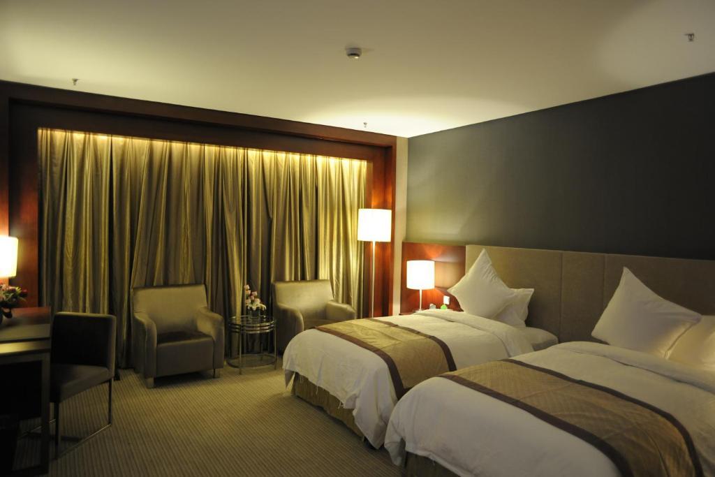 Wuhan Junyi Dynasty Hotel Zimmer foto